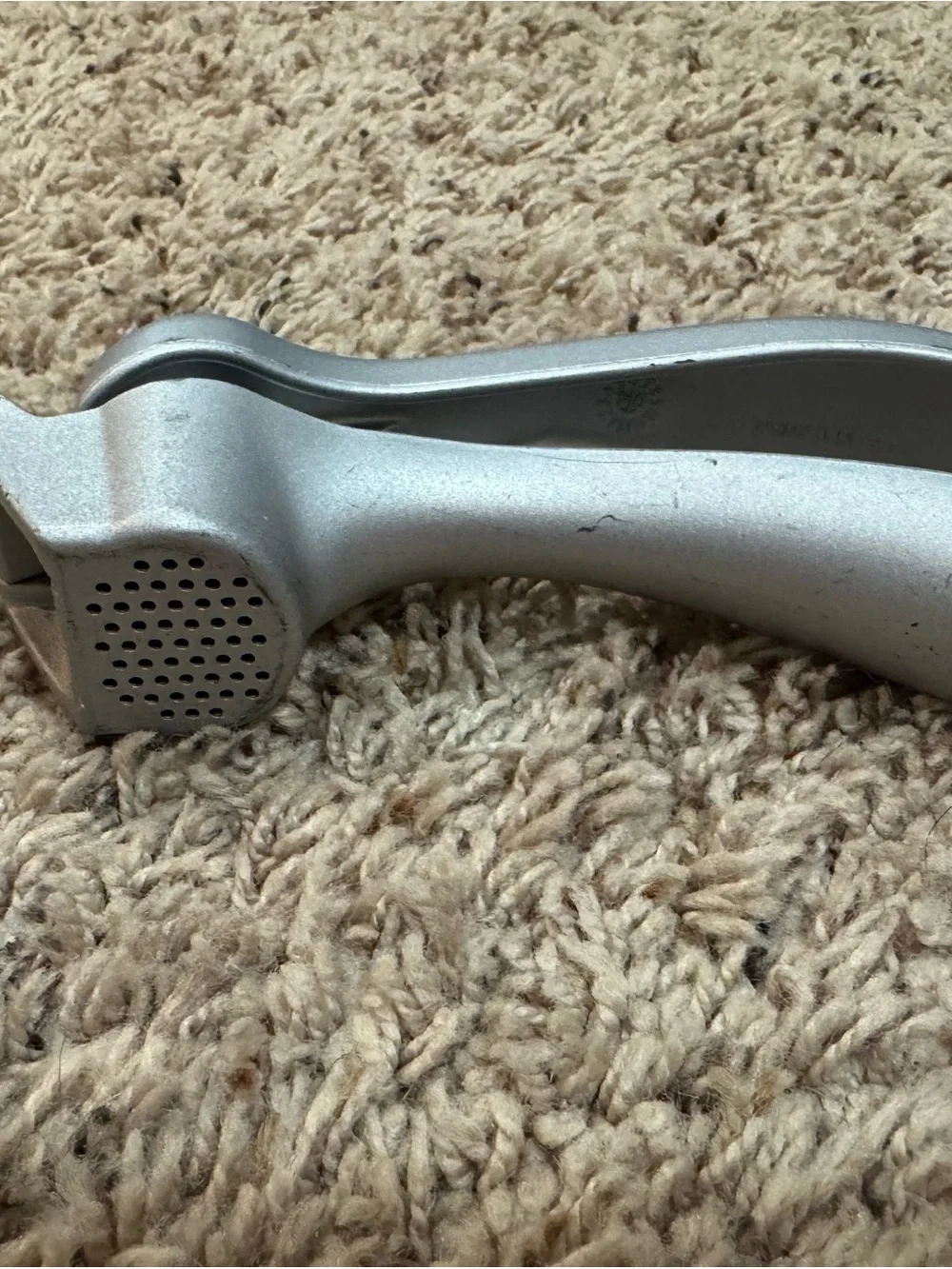 The Pampered Chef Garlic Press